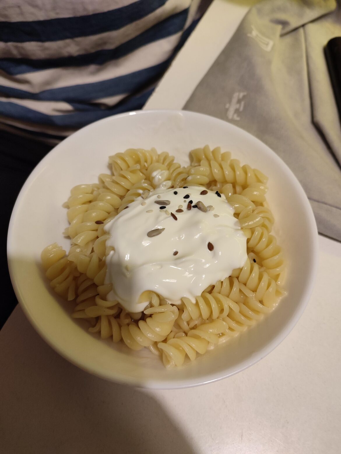 My sister ate two bowls of "White macaroni" it's plain pasta, sour cream, salt and some seeds. Jesus