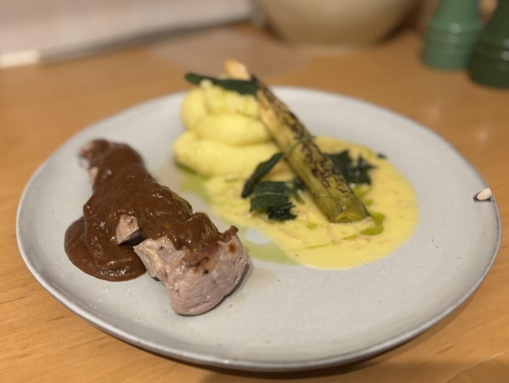 New years dinner - sous vide pork tenderloin, potato mash, leek and plum juice