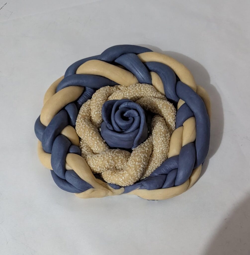 I love trying to incorporate flowers into my bakes - here's my attempt with Challah