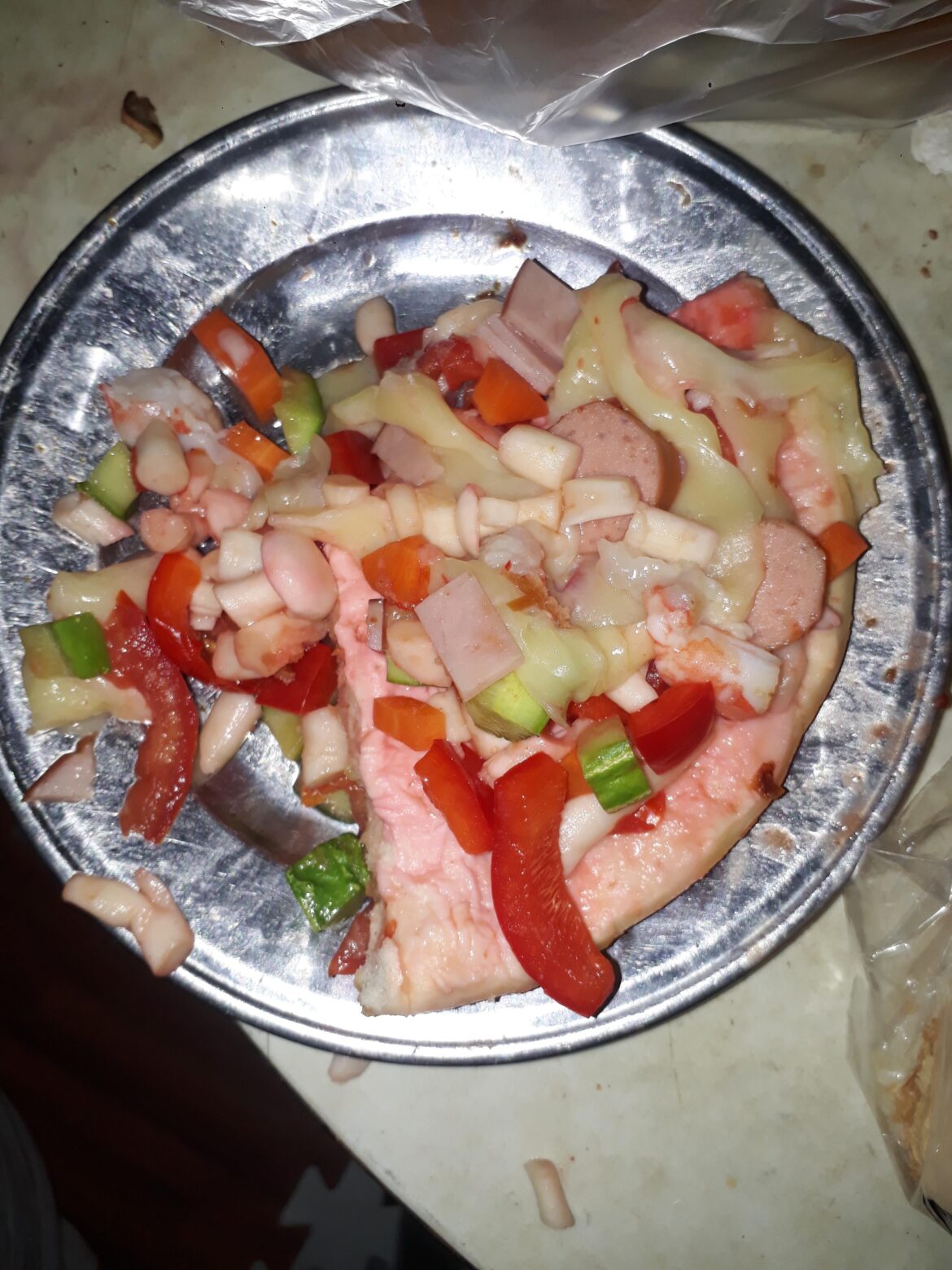 This half-eaten pizza that my mom (and i) made