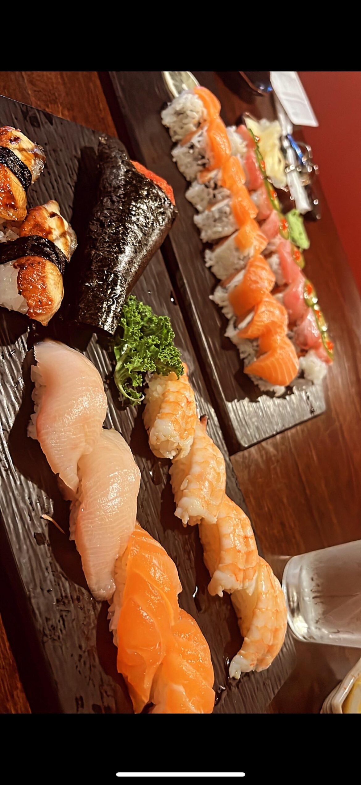 Sushi cut rolls, hand roll, and nigiri