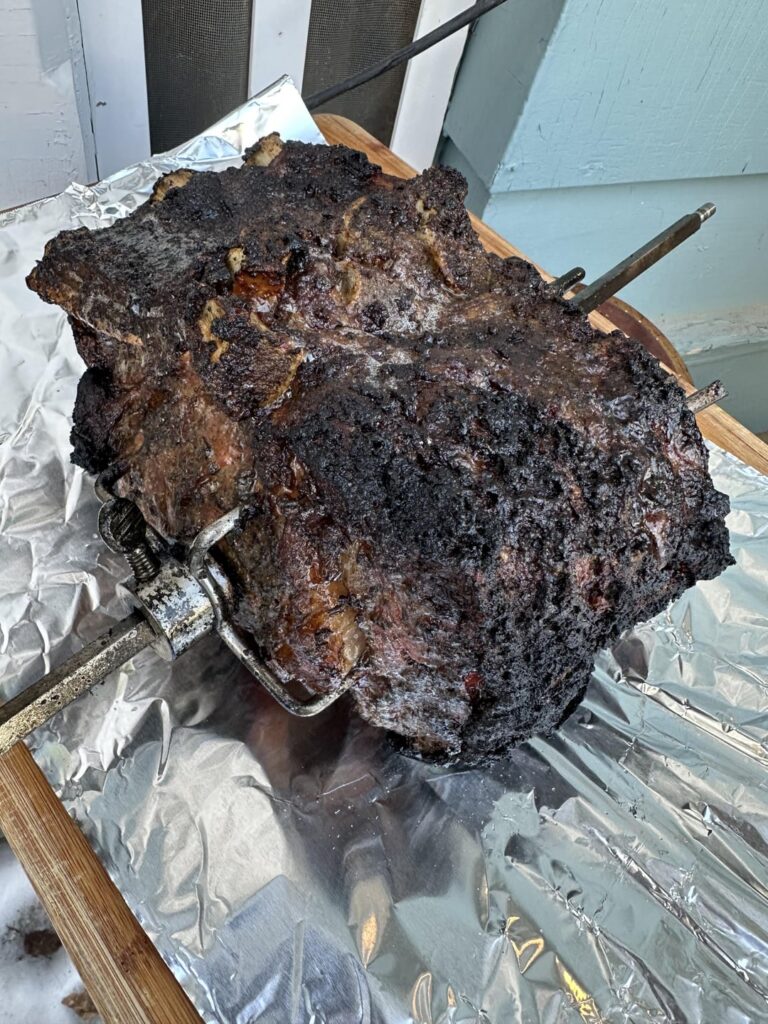 Bone in Prime rib on rotisserie.