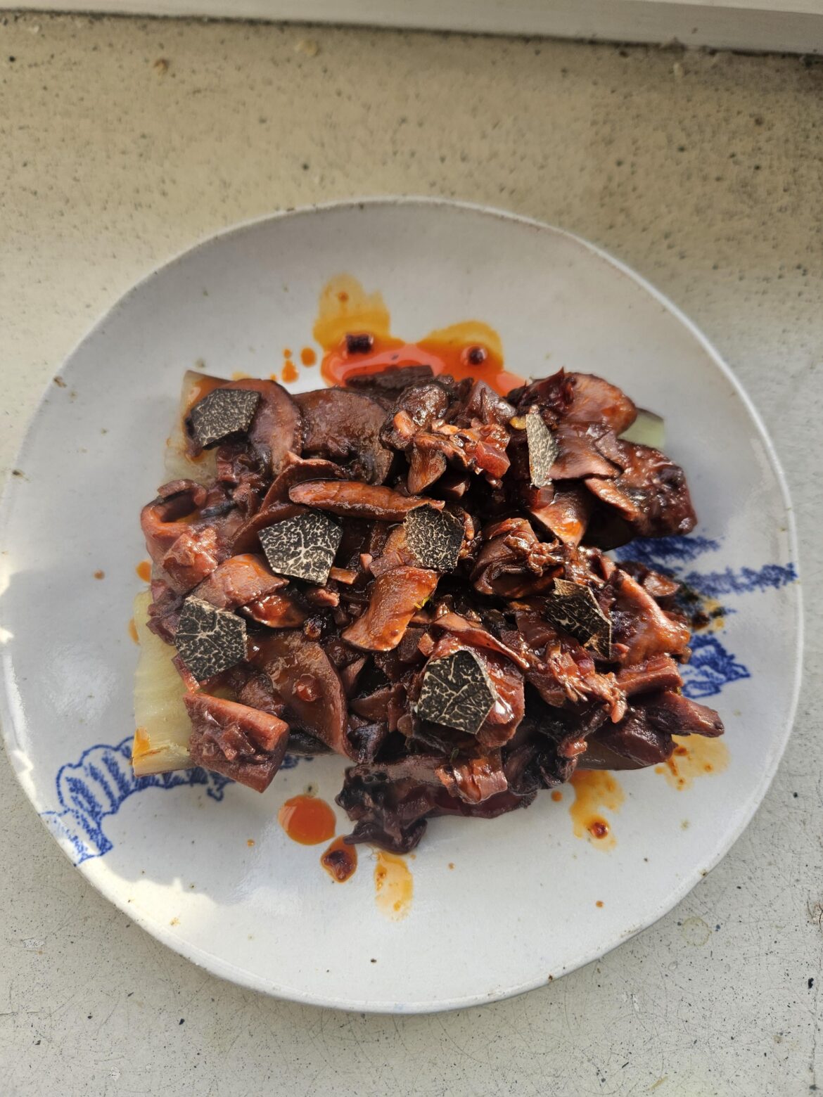 Mushroom ragu on sweet potato, chili oil and truffle.