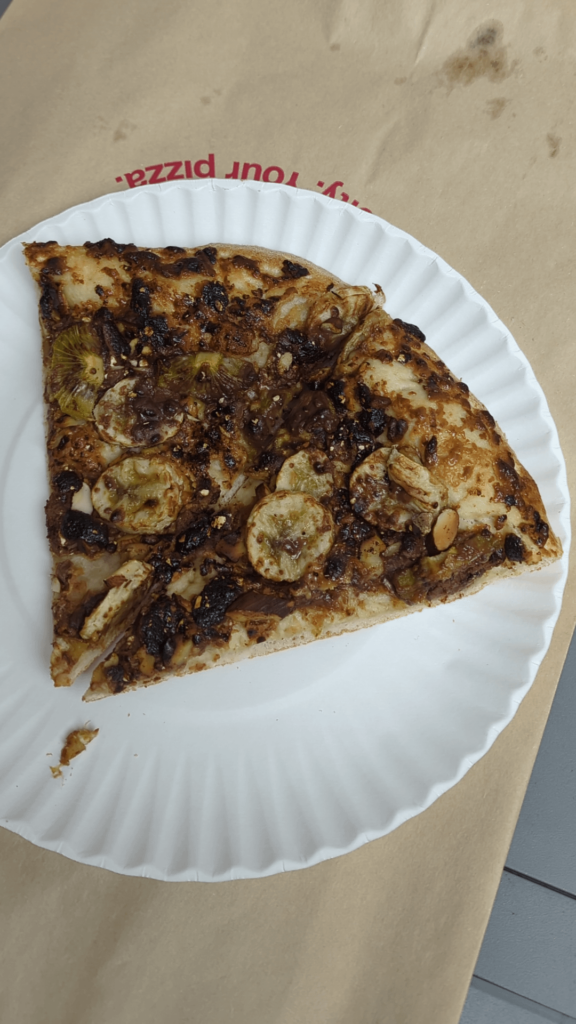 This free pizza topped with kiwis, bananas, almonds and mysteries