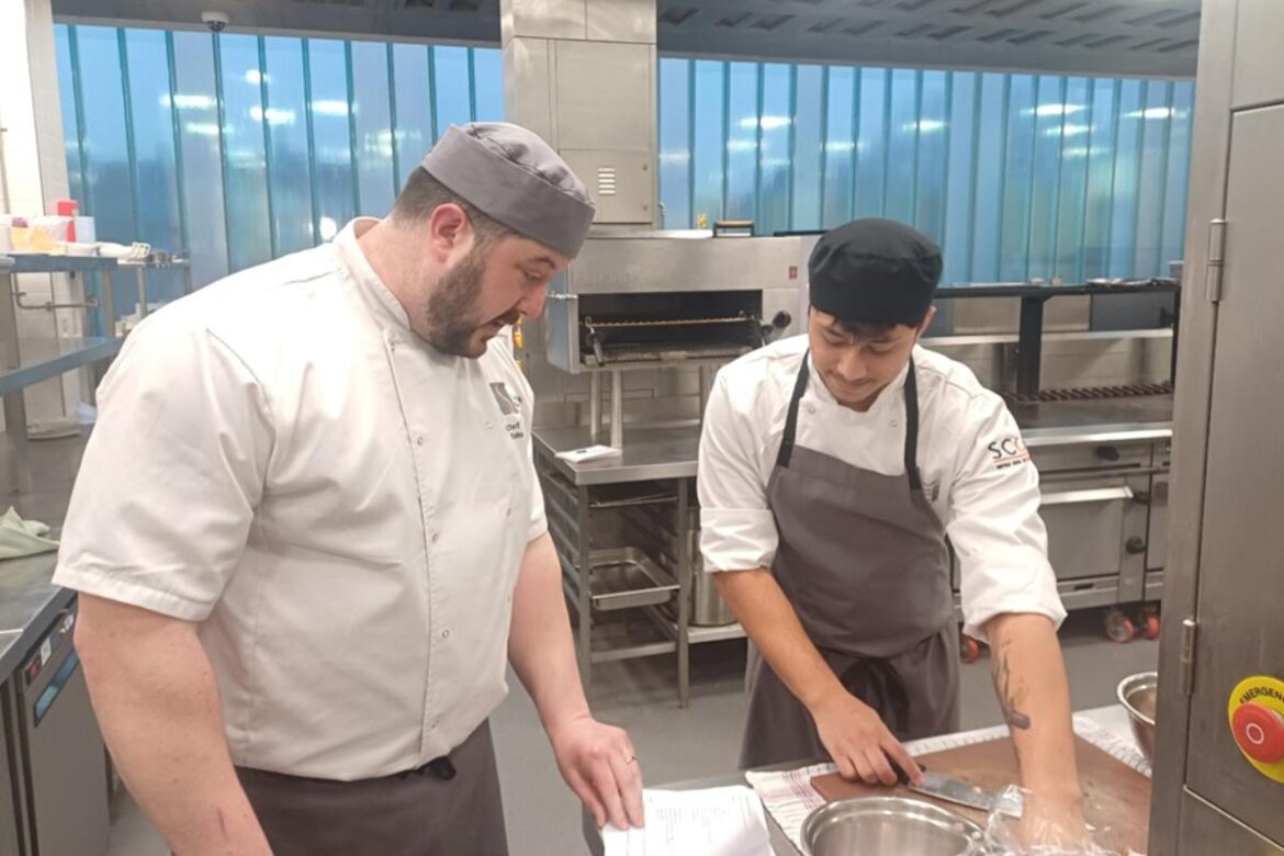 Chef lecturer Dale Knights with professional cookery student Harnesh Rajasinghan <i>(Image: Suffolk New College)</i>