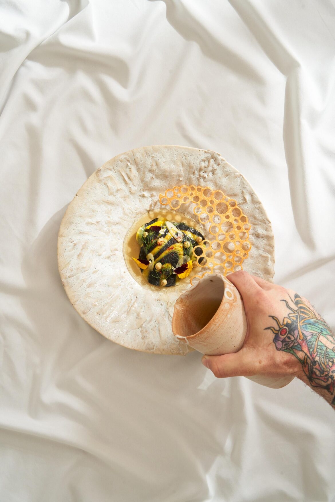 Squid ink and charred corn husk corzertti