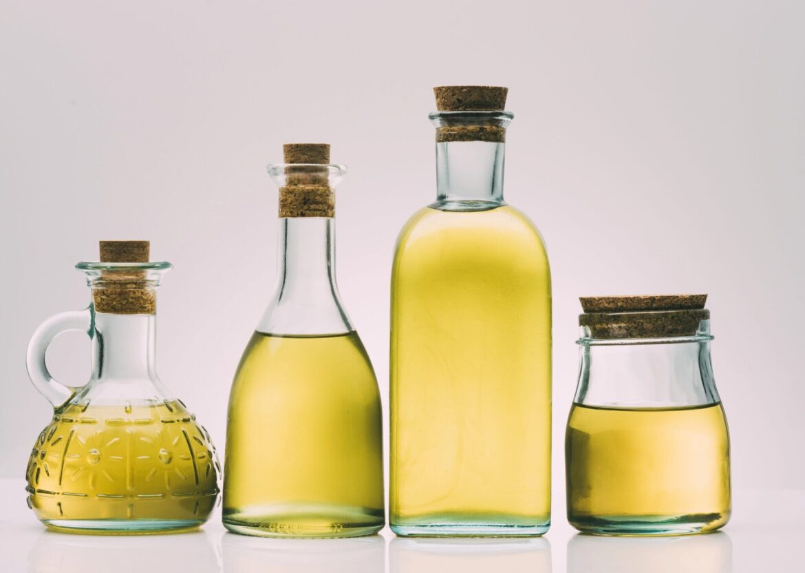 Cooking Oils Tested for Phthalates Guide with Cooking oils in glass bottles in background