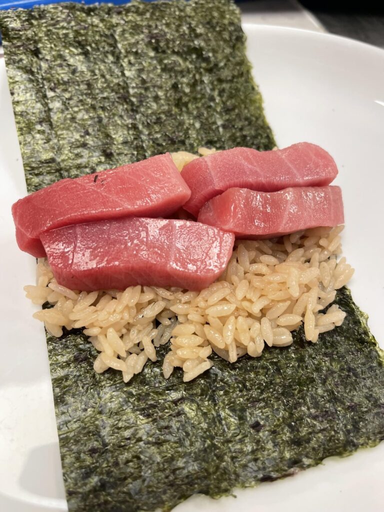 Little snack of Spanish tuna Otoro hand roll. Red vinegar and rice from Kyoto.