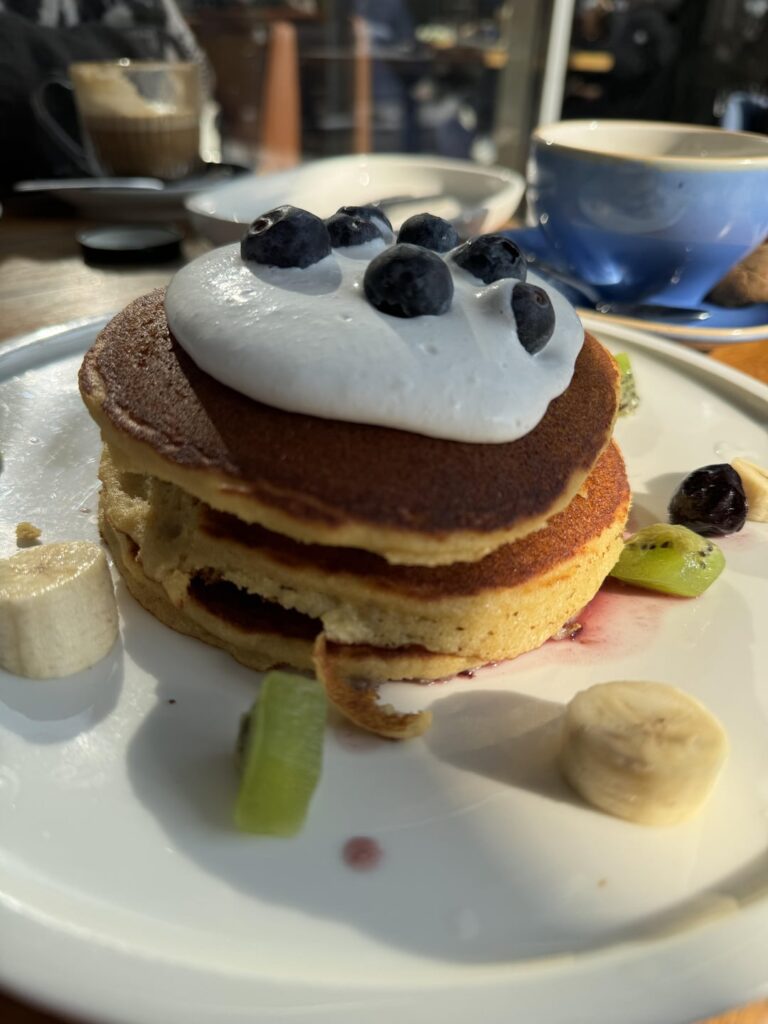 calories in this stack of 3 gluten free pancakes? coconut cream on top but i scraped off about half of it. there were also some blueberries in between the top 2 pancakes :)