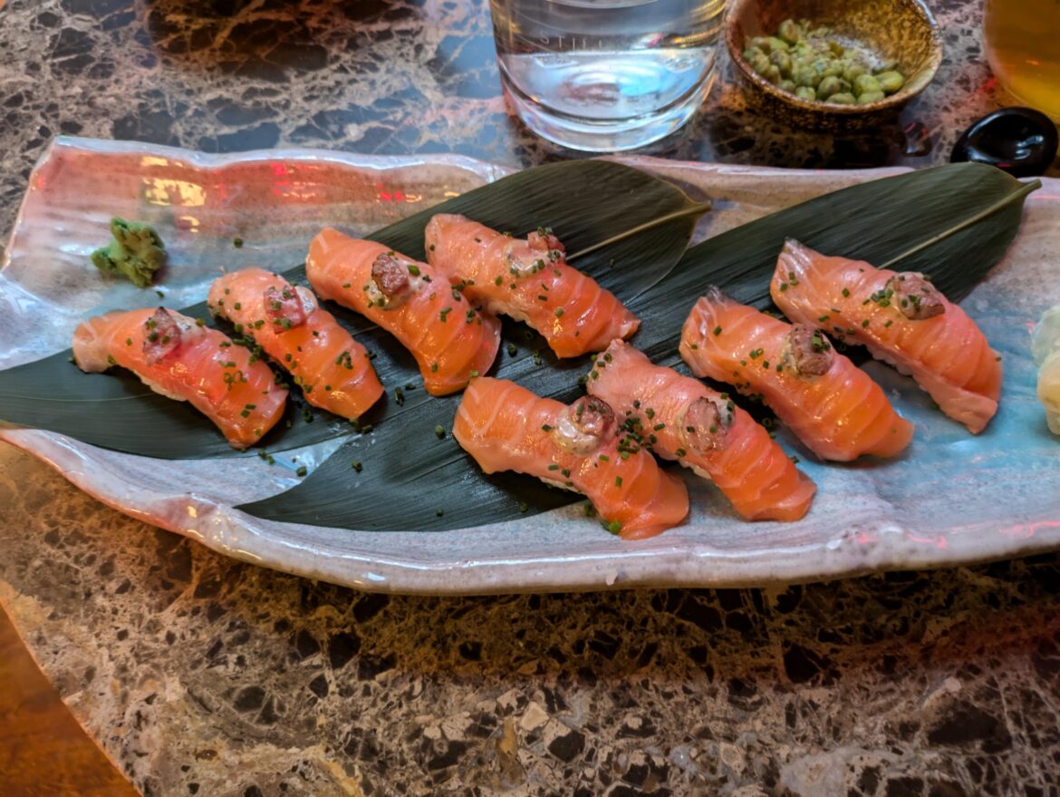 Very lightly seared salmon+wagyu nigiri with truffle mayo. Best sushi I've had