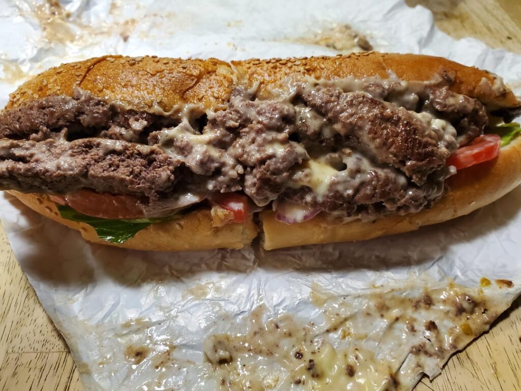 First time eating a Chopped cheese sub with Cooper cheese.