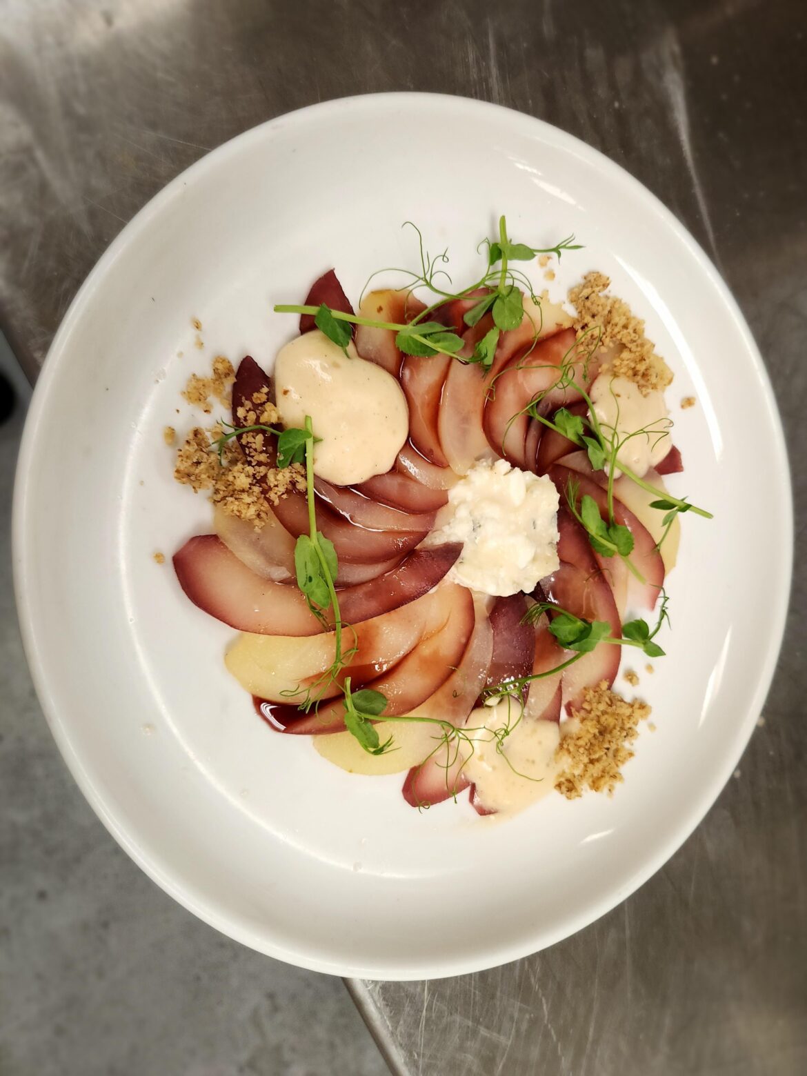 Pears Poached two ways, Humboldt Fog Goat cheese, Walnut Dust, poaching liquid reduction, and vinalla bean foam