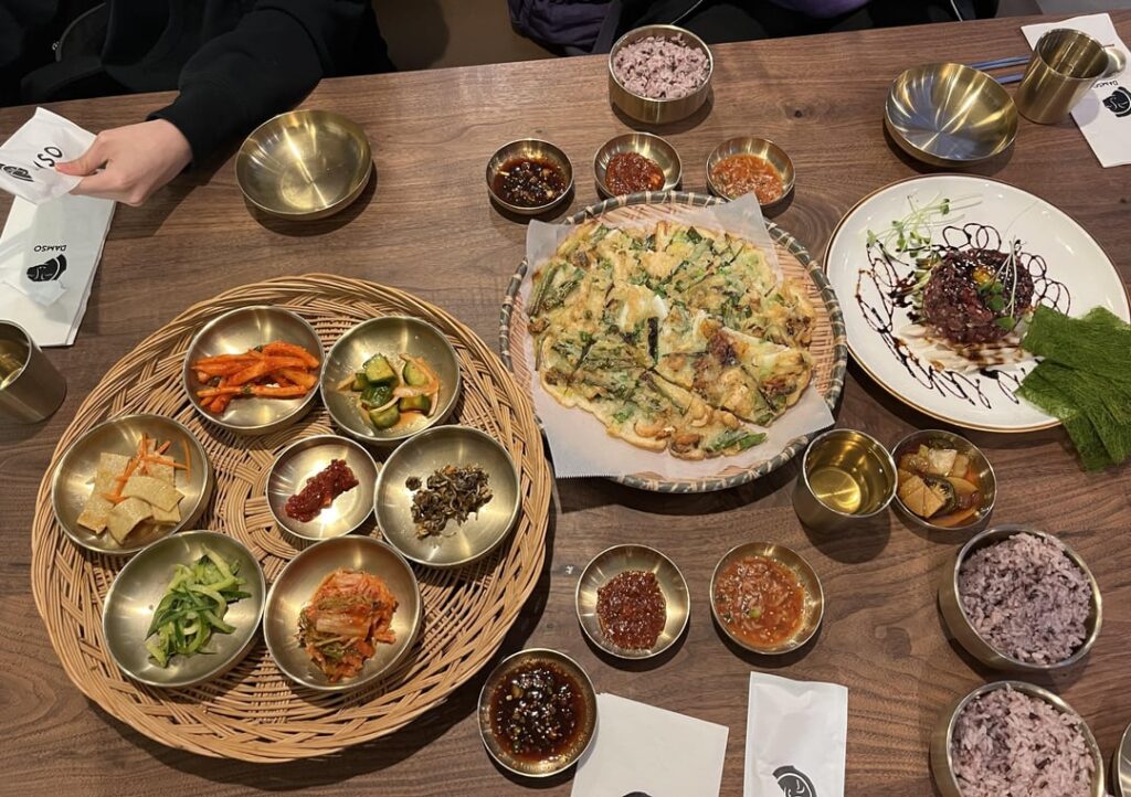 Banchan, seafood pancake, beef tartare, bossam and LA galbi from Damso in Santa Clara