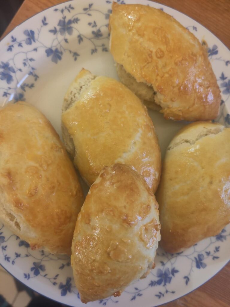 Yeast buns filled with fried mushrooms, onions, and cheese — пиріжки з грибами