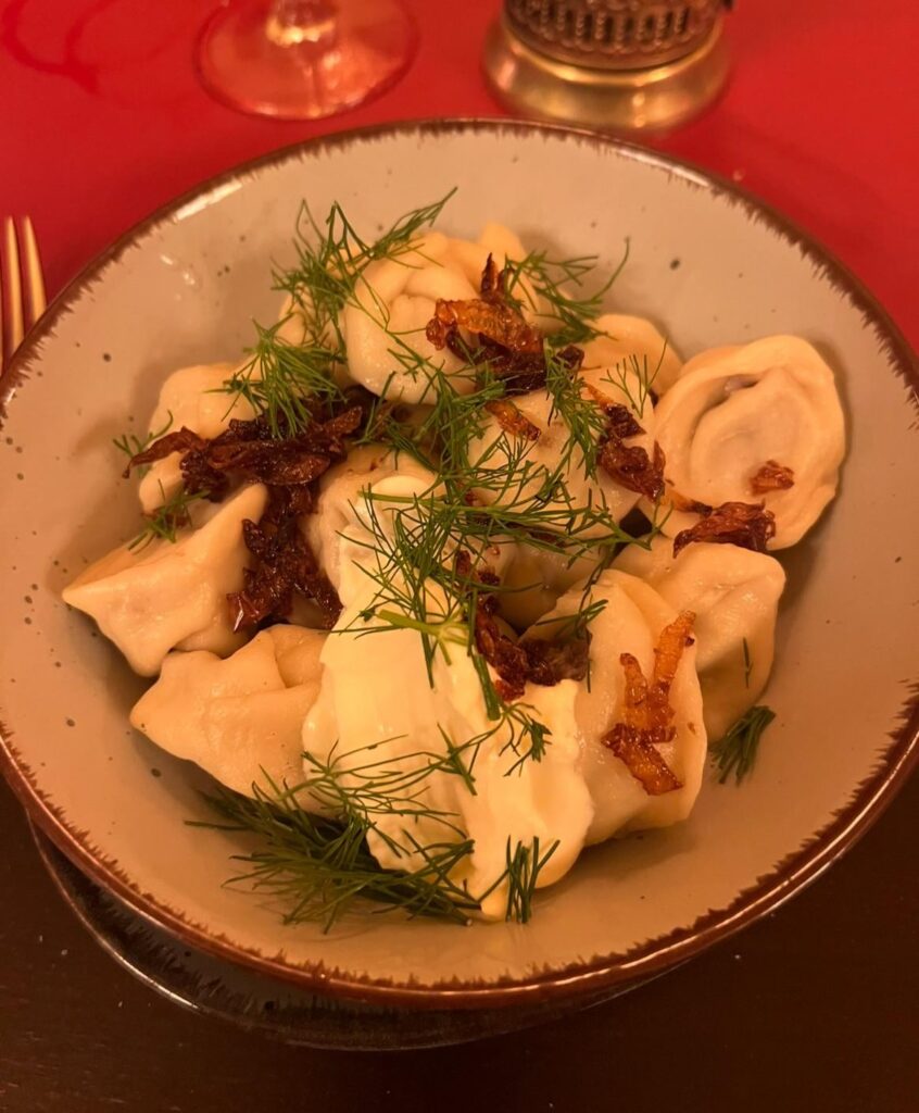 Pelmeni with fried onions