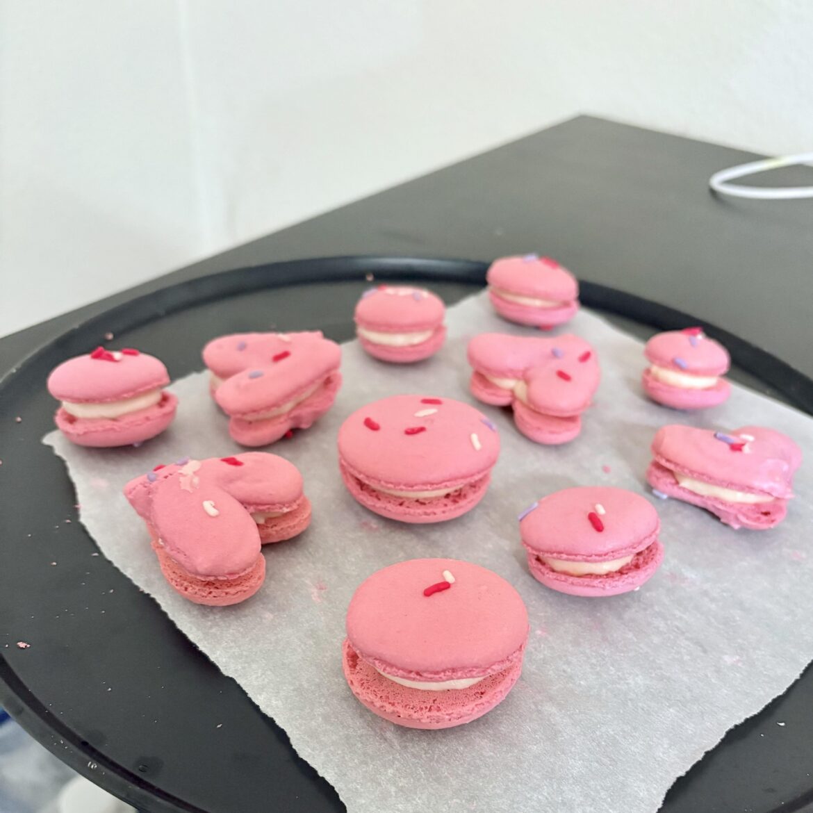 Pink macarons with almond buttercream