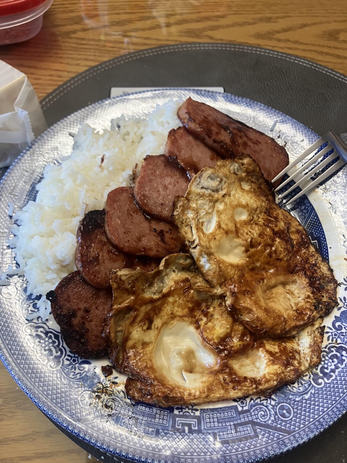 Spam with burnt ass brown sugar, rice, and over easy eggs