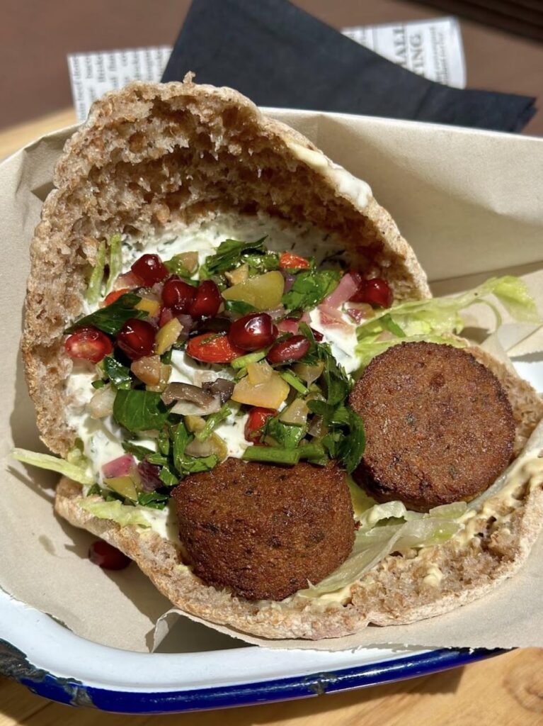 How many ckal could this falafel pita with tzatziki and hummus have? It’s not super big.