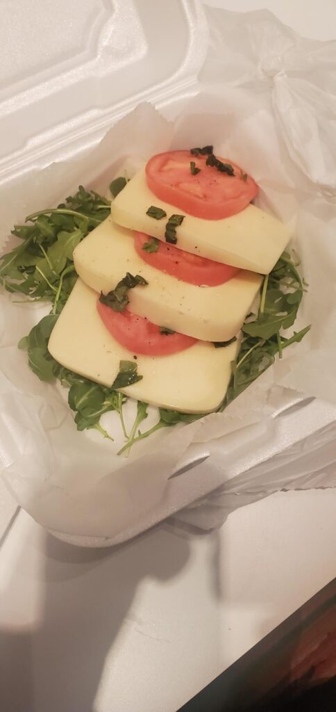 Got my to go food home and was surprised by this embarrassment of a caprese salad 🤦🏽‍♂️