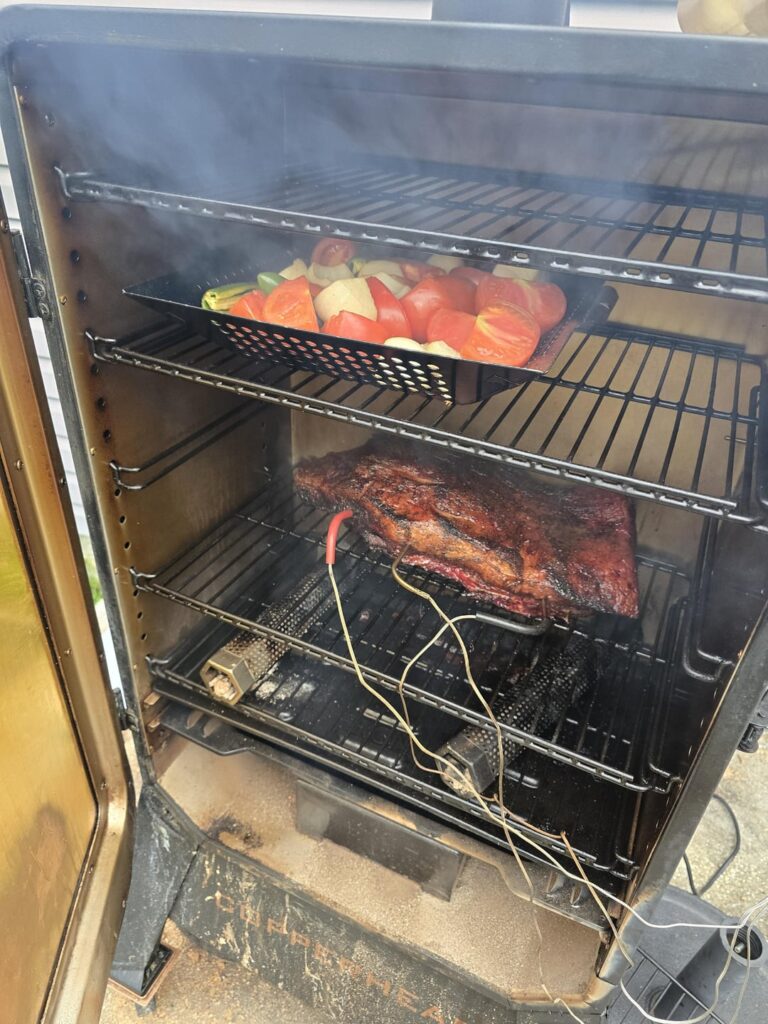 Brisket and salse in vertical pellet grill
