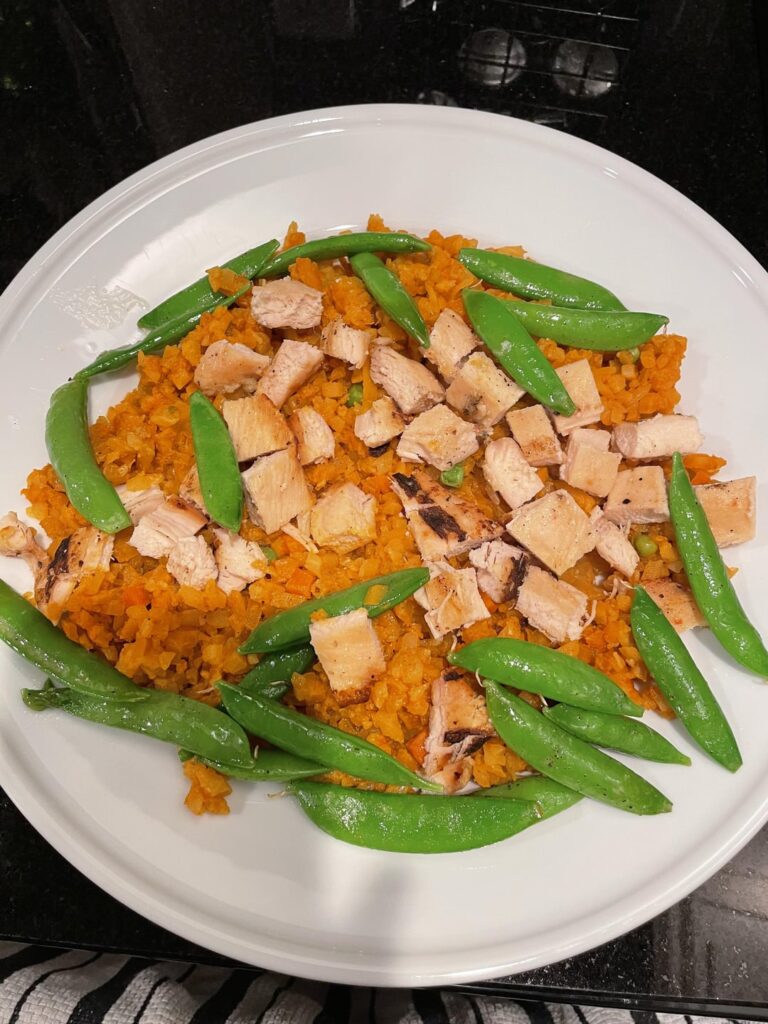 345 cals, 32g protein Spanish cauli-rice, grilled chicken and snap peas