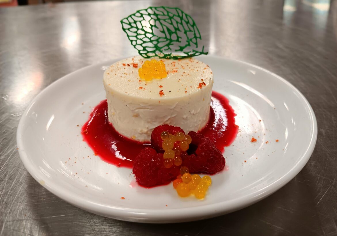 Lemon Posset-lavender raspberry coulis-pineapple sage tuile-lemon pearls-raspberry dust