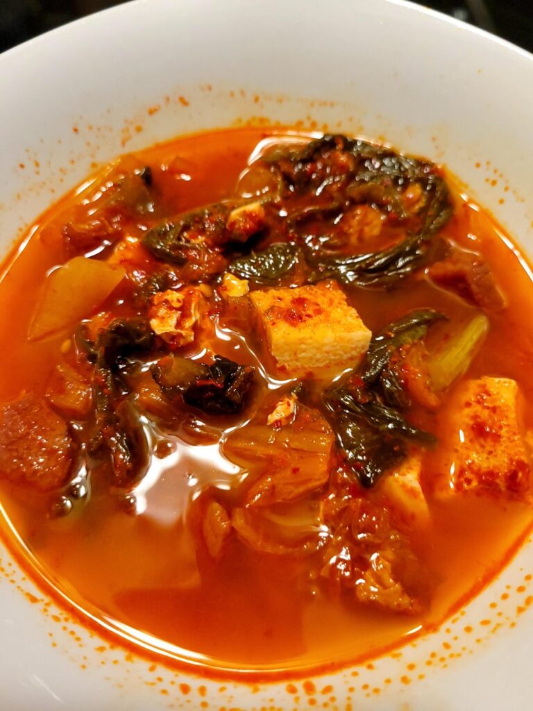 I made kimchi jiggy with 6 month old tofu and 3 year old ham. Secret ingredient: Goya ham sazon. Some celery too for good measure.