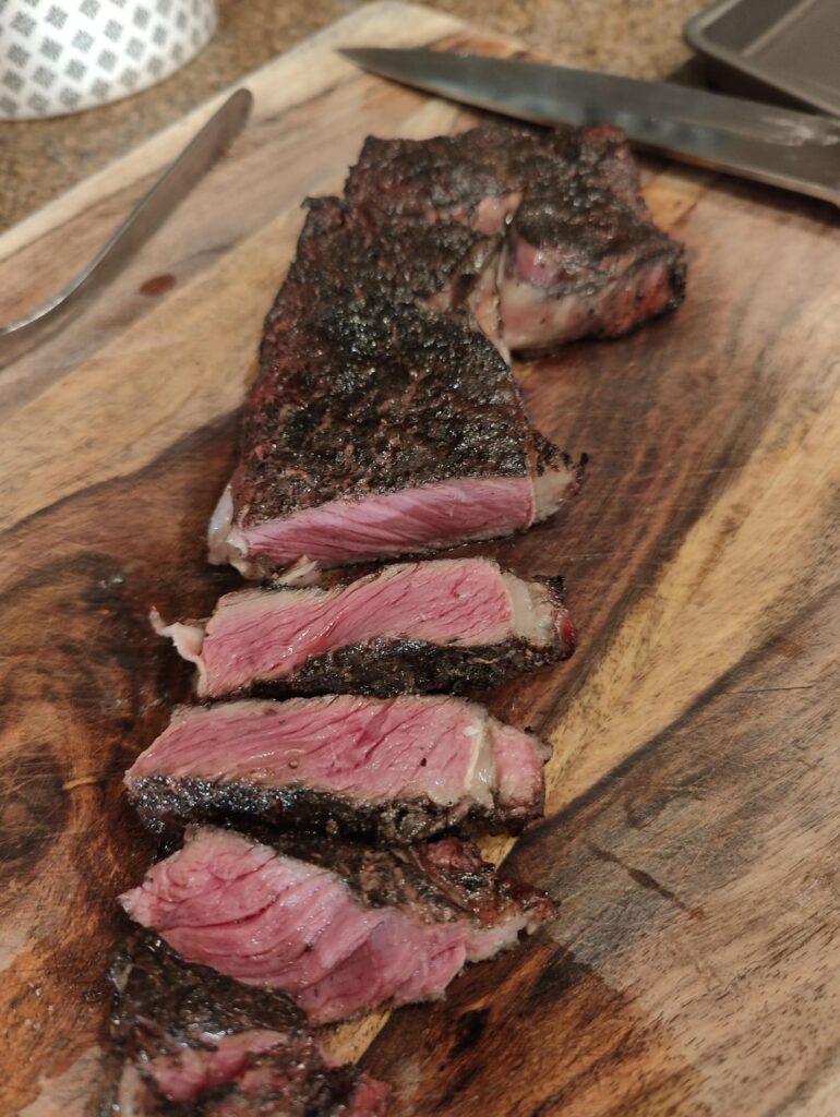 2nd attempt! Ribeye over lump Charcoal and smoked ribeye bone