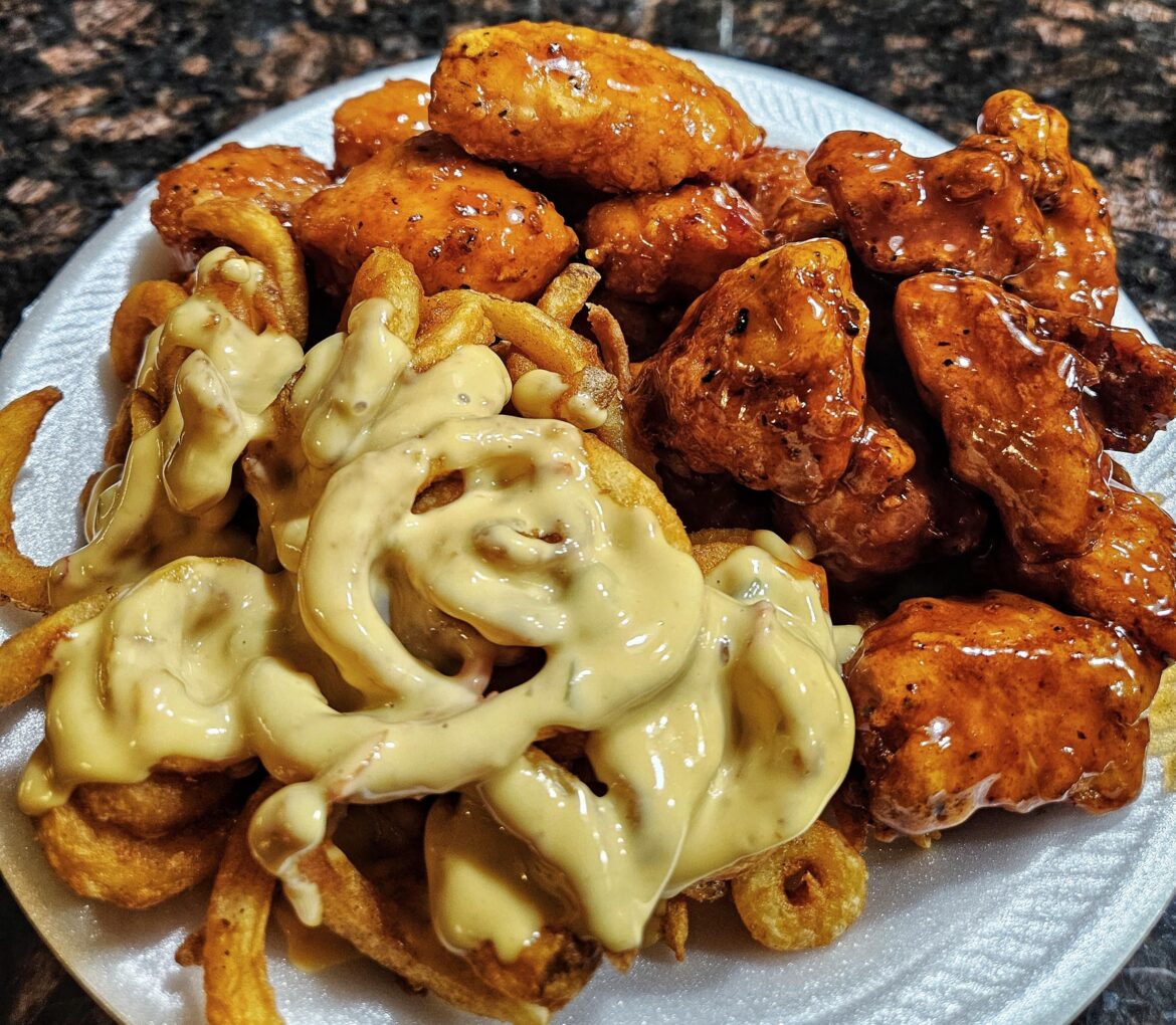 [homemade] Boneless wings and cheesy curly fries.