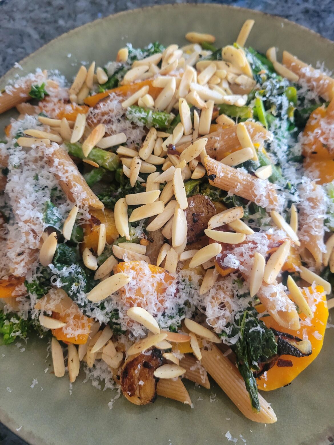 Rapini with butternut squash, shallots and almonds over whole wheat pasta