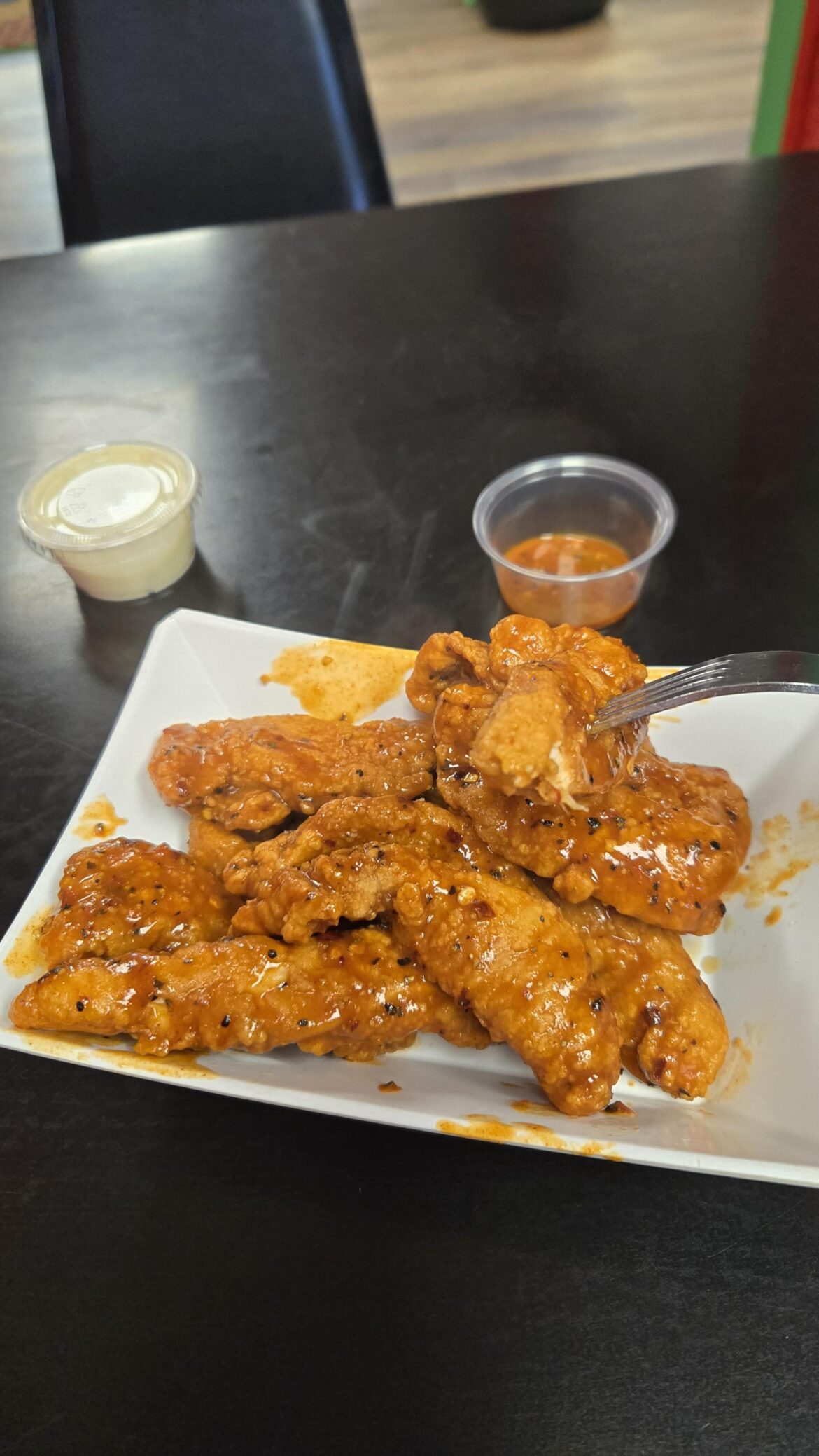 Visited a local family run restaurant. Asked for spicy wings.