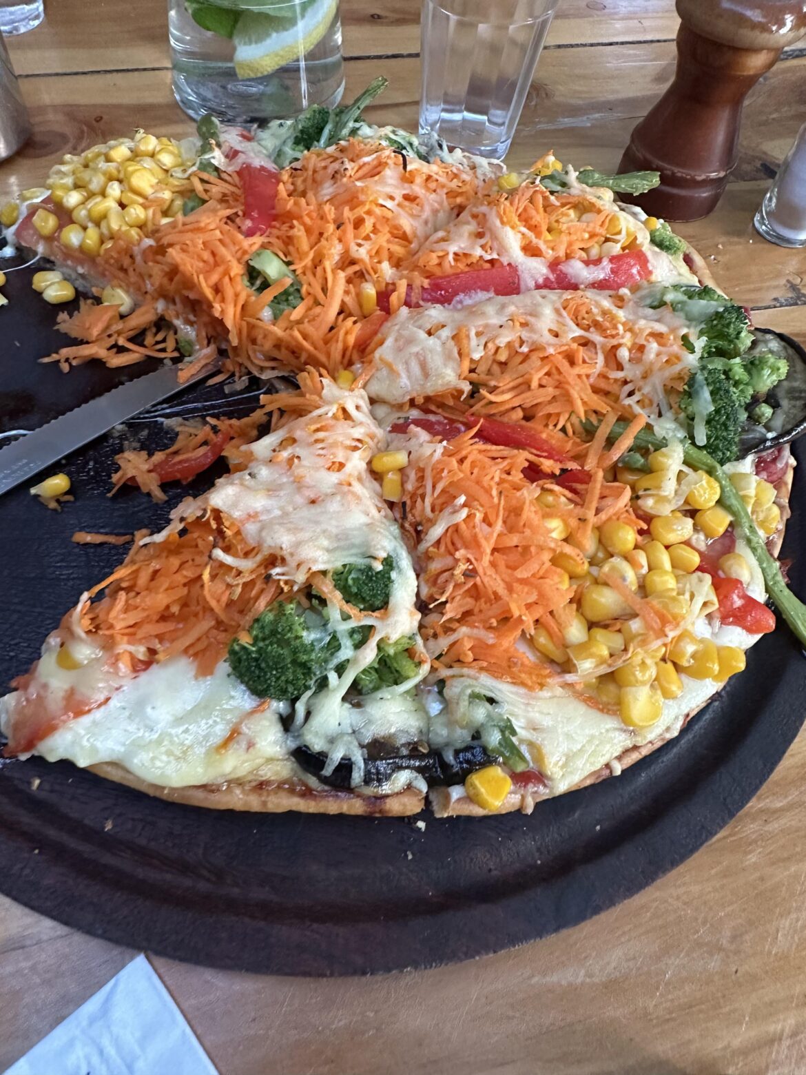 Vegeteriana Especial from a restaurant in El Chalten Argentina. Cover your pizza in a bagged salad!