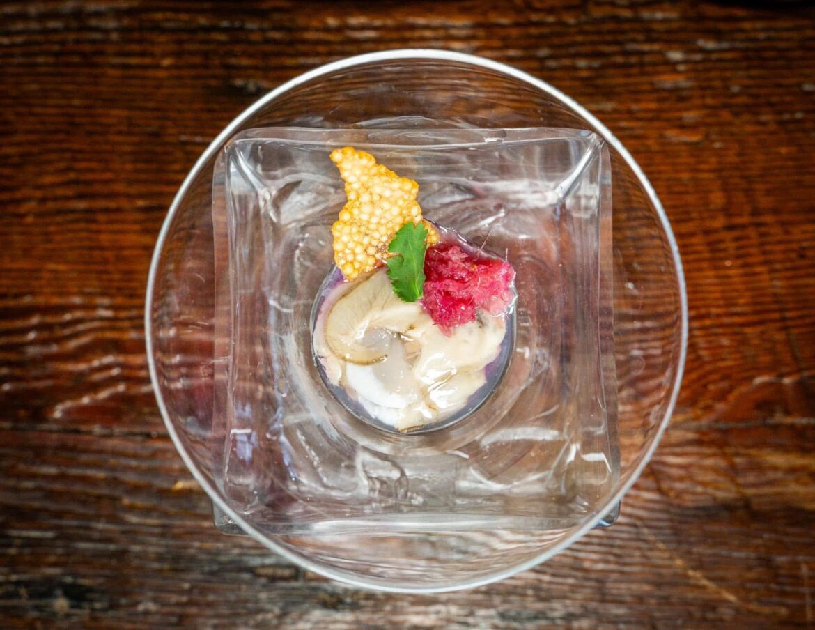 Shucked oyster, pickled ginger, tapioca chip, parsley