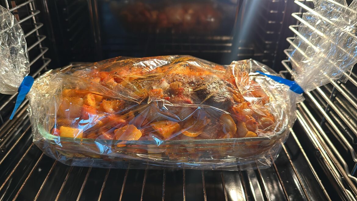 Hey im from Germany i made a young bull roast with potatoes, carrots, onions, and garlic. An oven roasting bag makes the meat nice and tender.