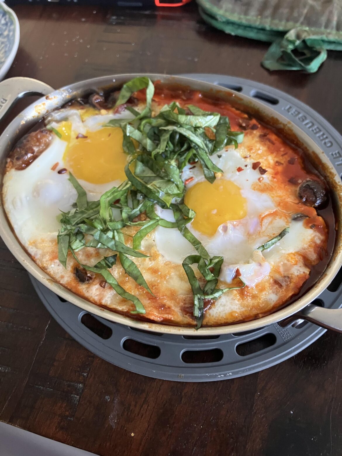 We made pizzas last night.  I had some leftover toppings so this morning I made “pizza shakshouka”
