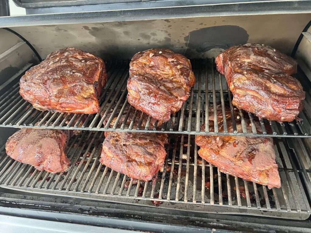 Pulled pork on my Traeger 1300 timberline super smoke for six hours and finished off in my dbl oven and Traeger within the steamer trays.