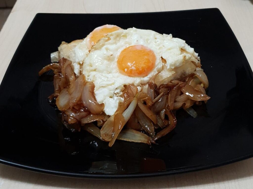 1. Cheese pie, eggs cooked in butter and caramelized onions. 2. Crepes with pistachio cream and whipped cream.