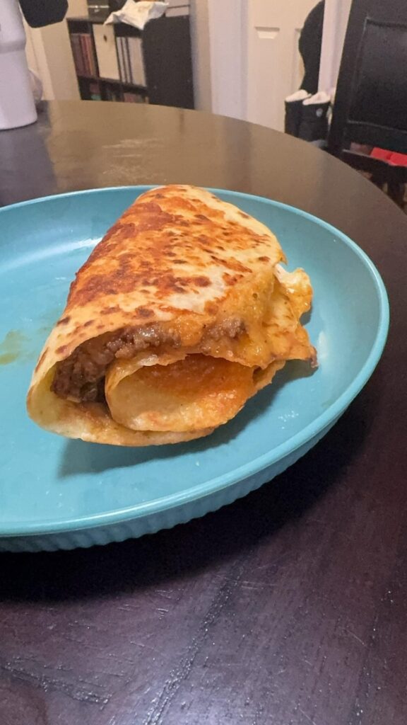Using homemade tortillas and leftover ground beef from last white people taco night, I’ve made this double decker cheesy taco.