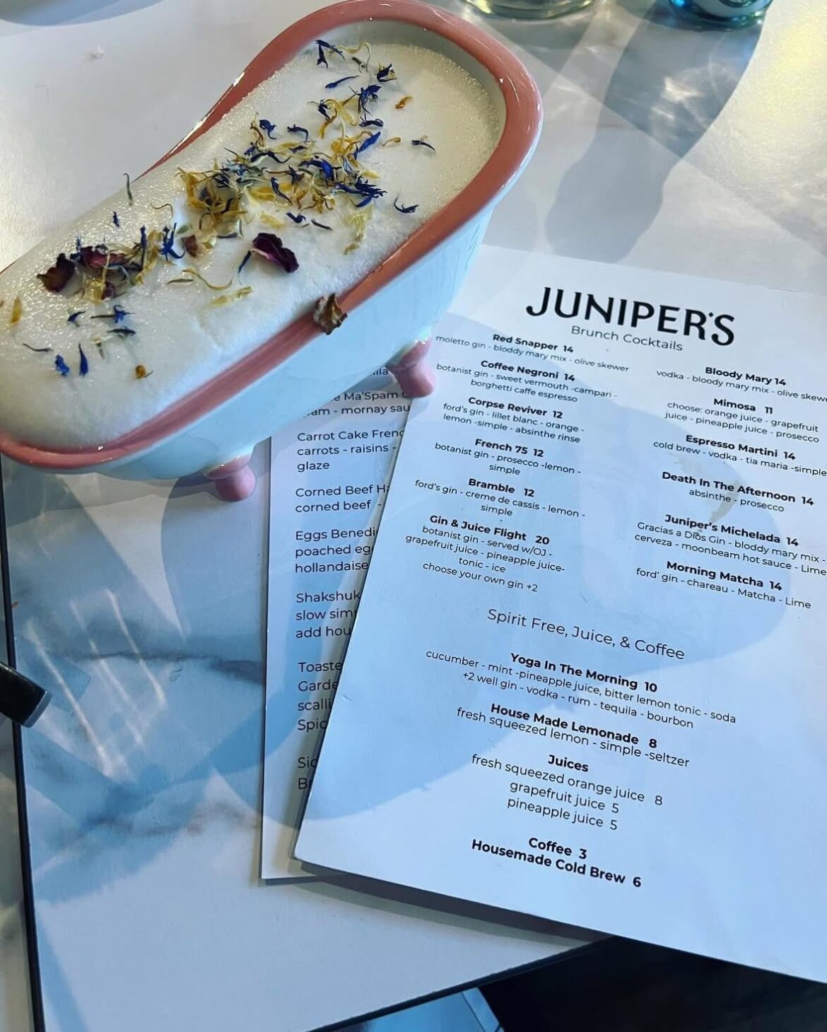 Cocktail served in a tiny bathtub