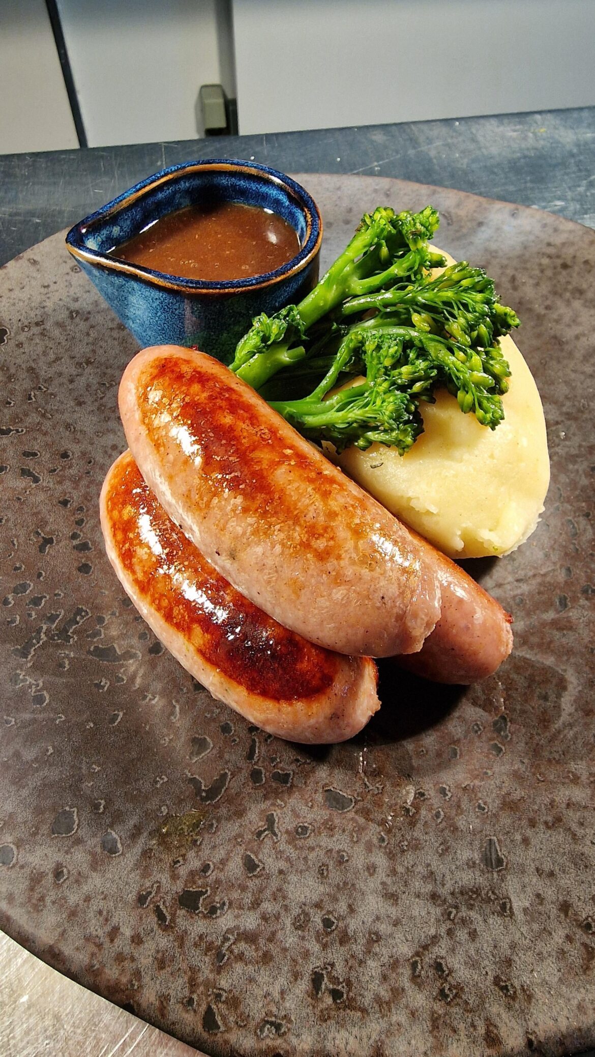 Sausage, mash, tenderstem, jus