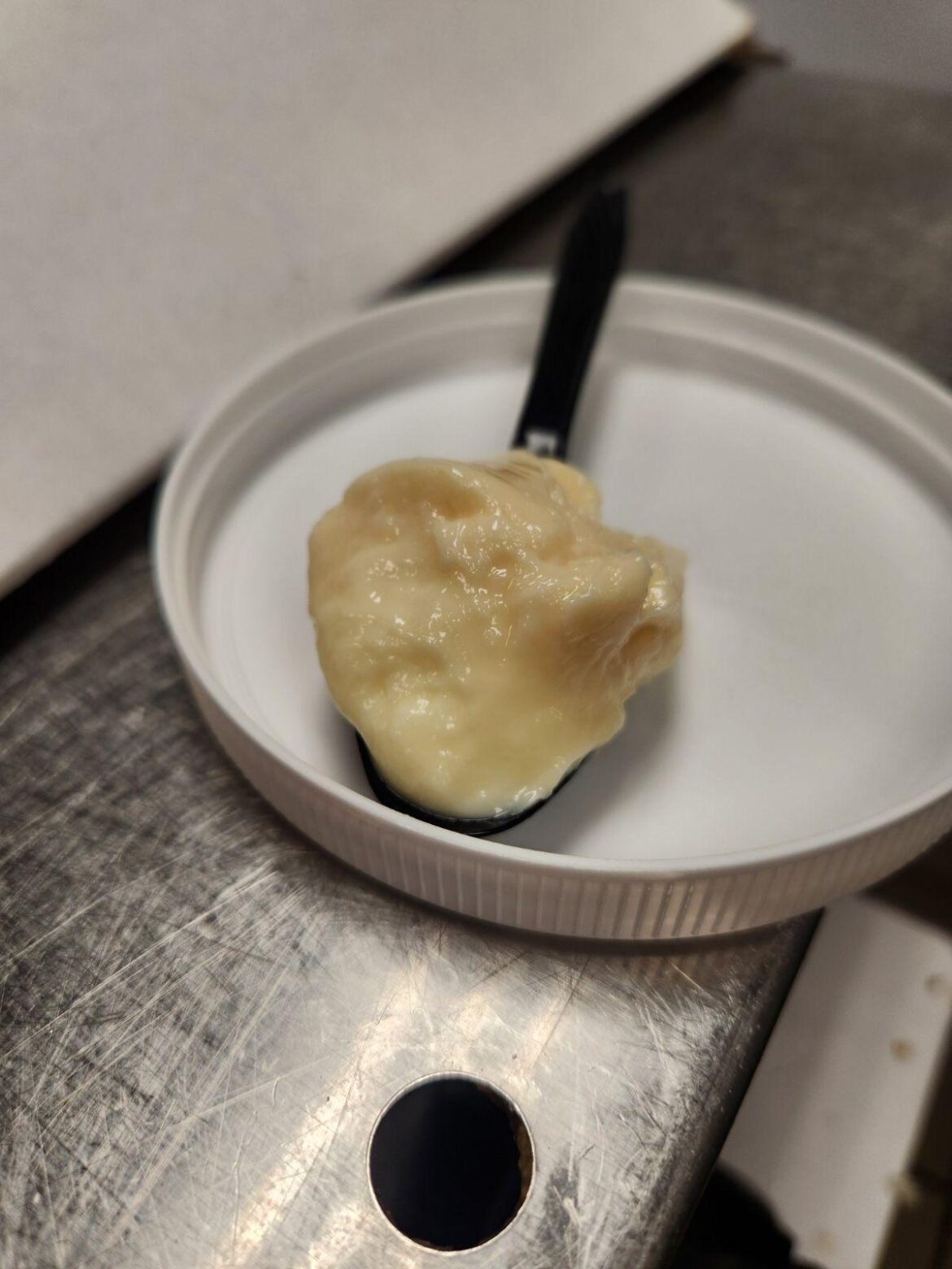 Supplier said that no one else has been conplaining about there orders of the mayo, and thinks its me. Am I going crazy? Mayo should not be brown on top..