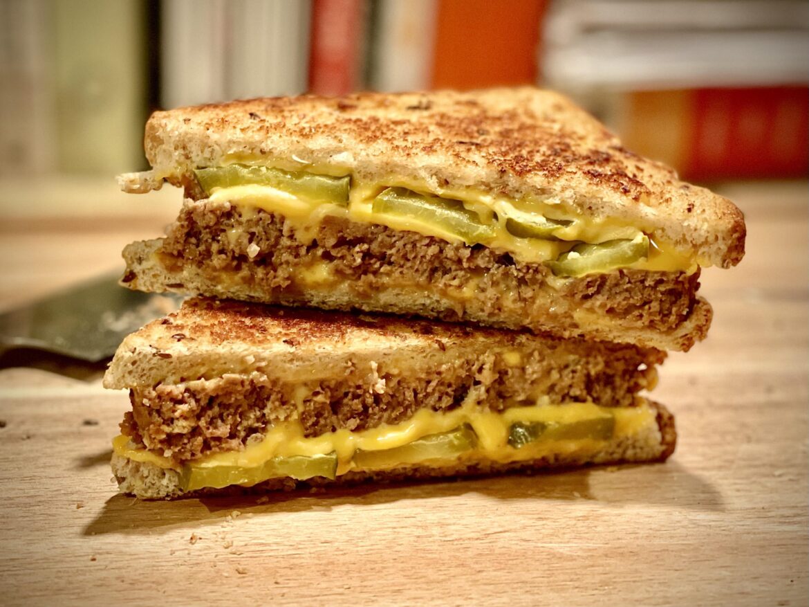 Leftover meatloaf sandwich with American cheese and dill pickles