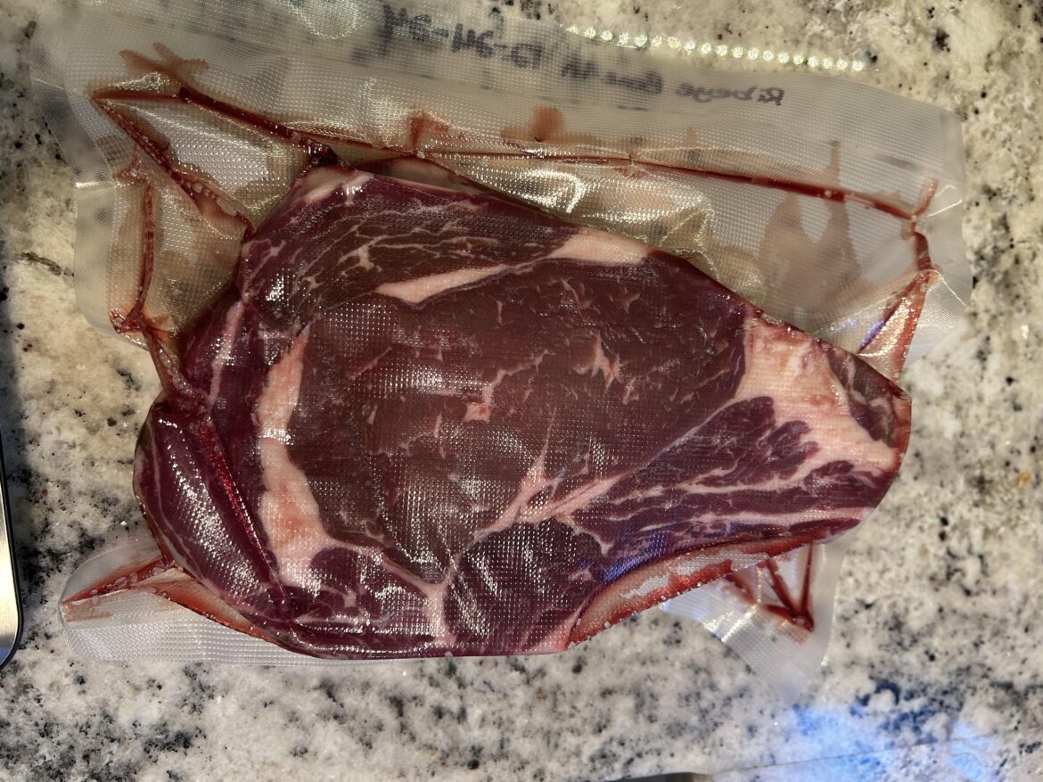 How long and at what temp would you sous vide this 1 lb 12 oz bone in ribeye?