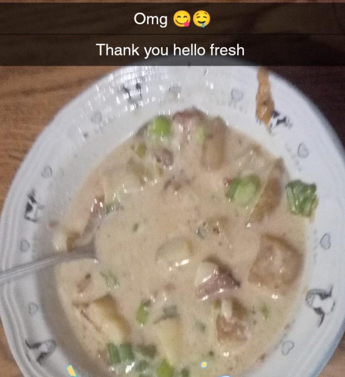 Loaded baked potato soup with bacon, cheddar cheese, sour cream, scallions, and hot sauce