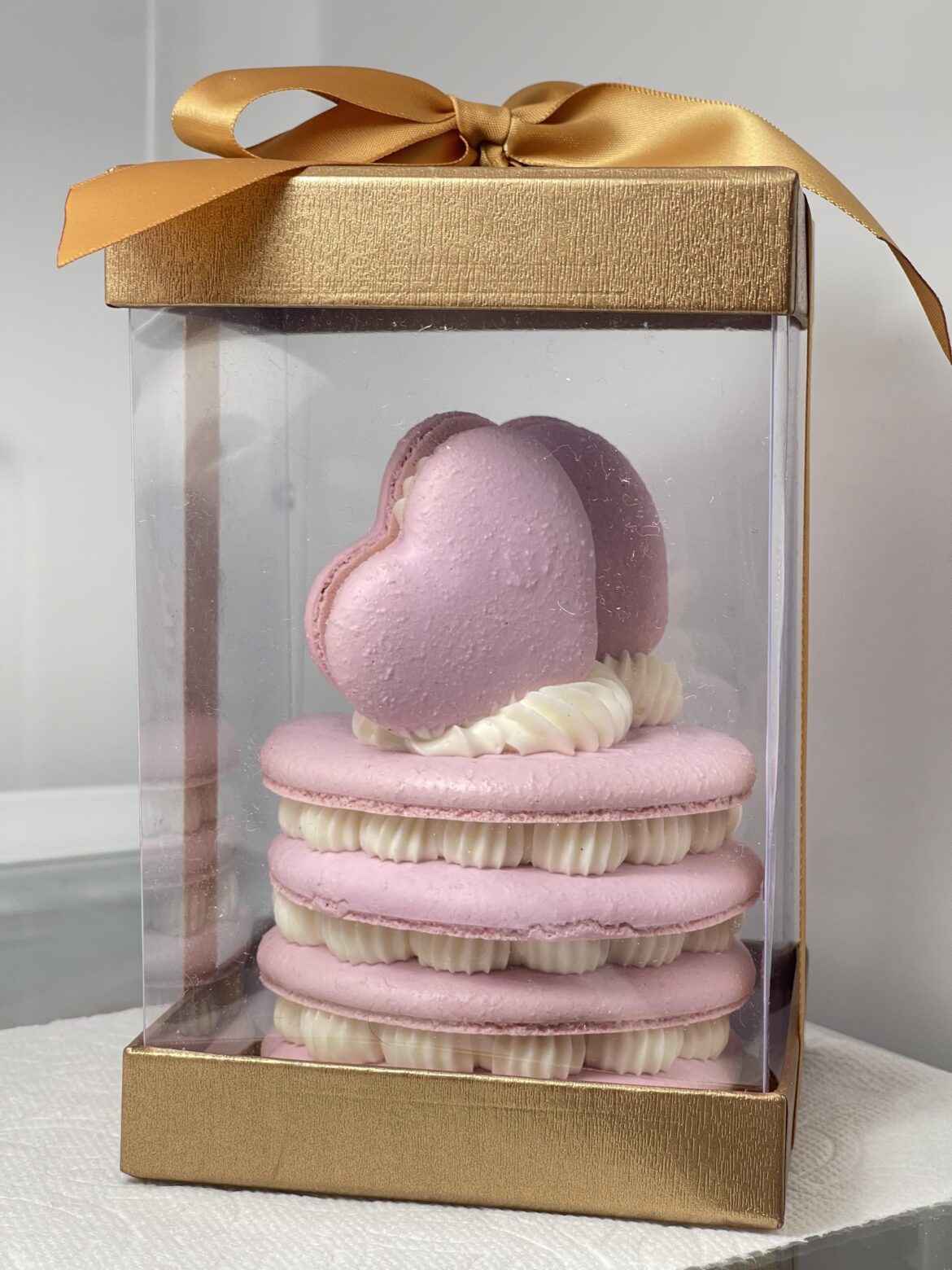 4 inch 4 layer macaron cake with Vanilla Buttercream and Passionfruit Ganache