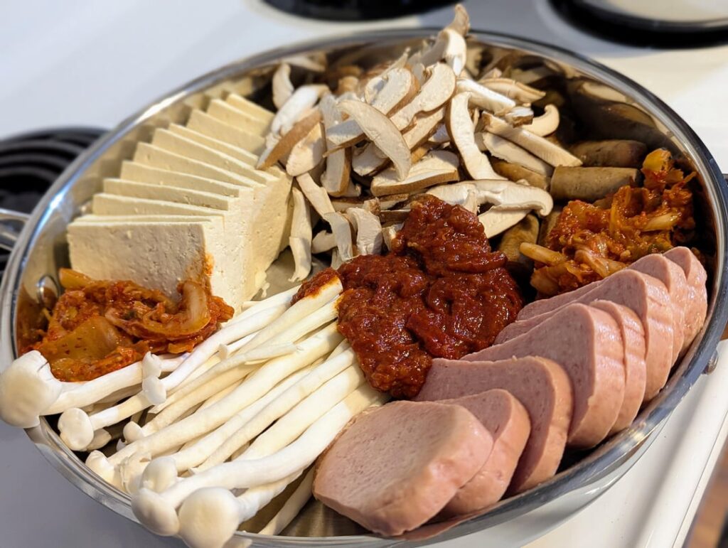 My First Korean Army Stew.  The first I've ever made. Holy cow it was rich. Oh, bacon spam. :)