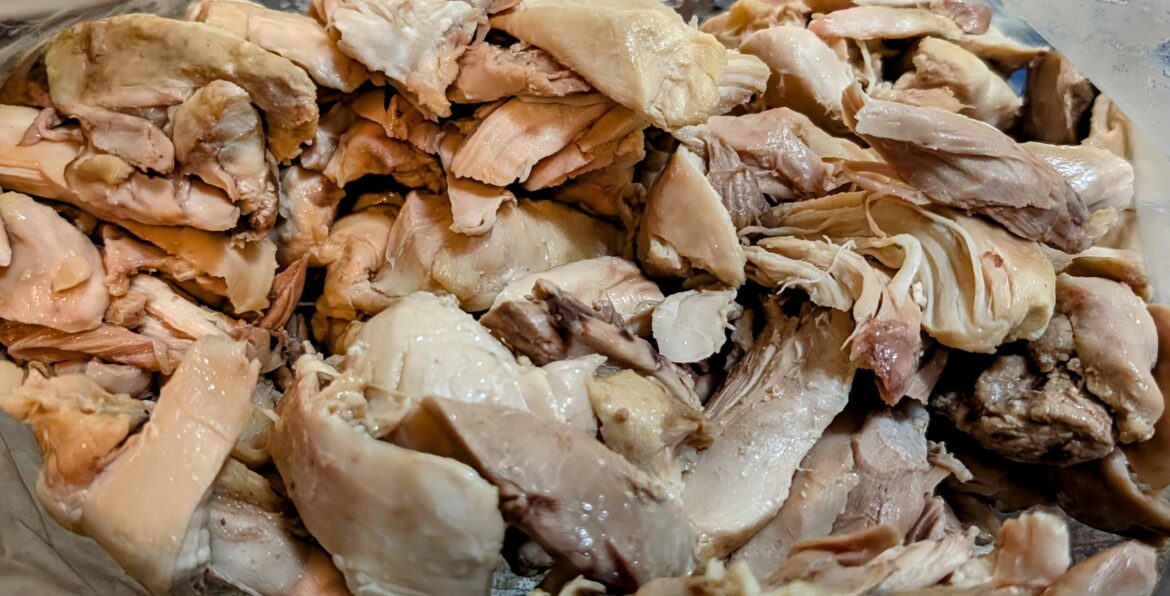 Slow cooker poached chicken thighs shredded meat Slow cooker poached chicken thighs shredded meat