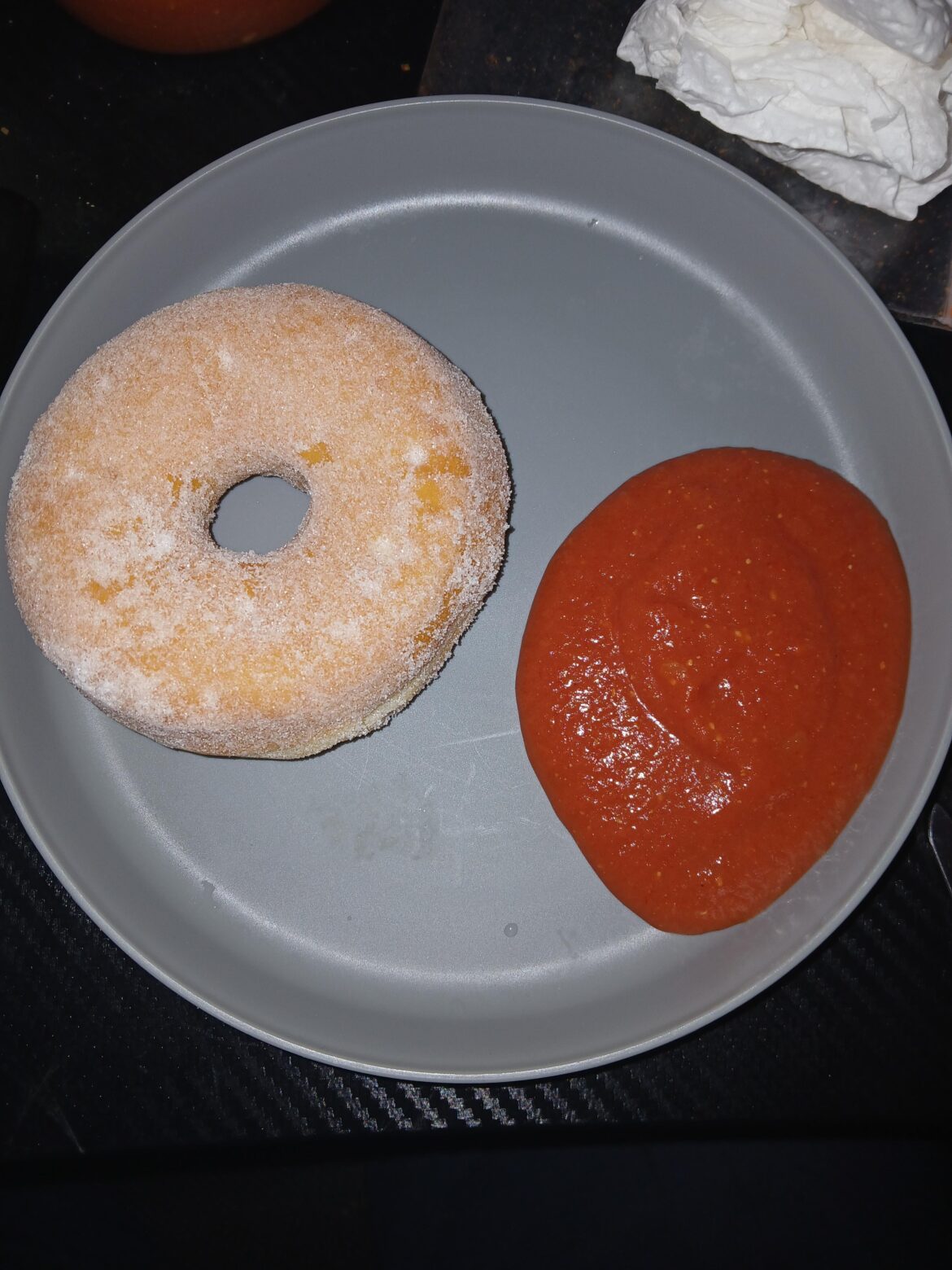 I must be pregnant because I'm eating a doughnut with spaghetti sauce. Which is actually really fucking good by the way!!