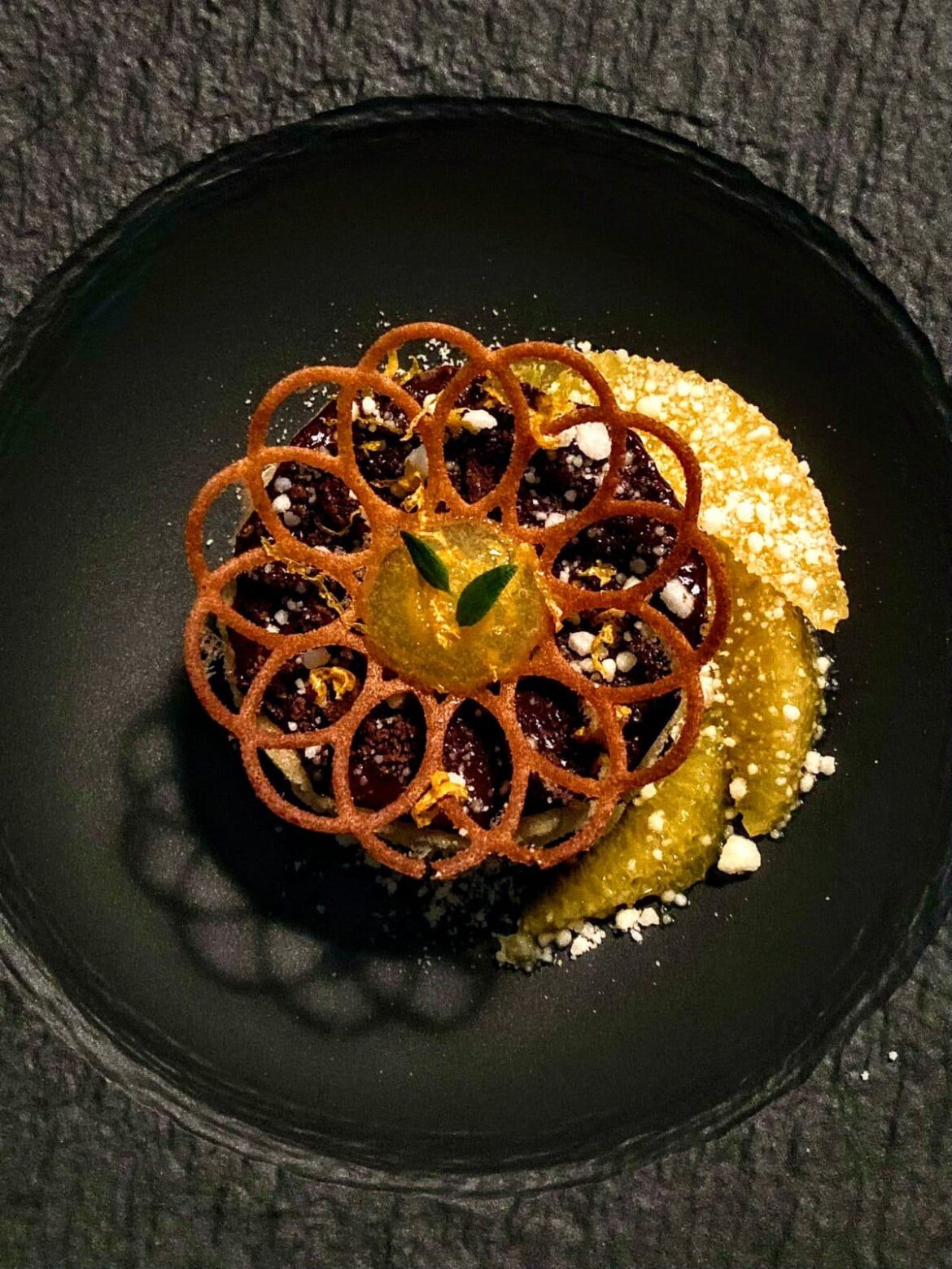 Orange financier, oranges marinated in their own juice, orange-cointreu gel, dark chocolate and brown butter tuile