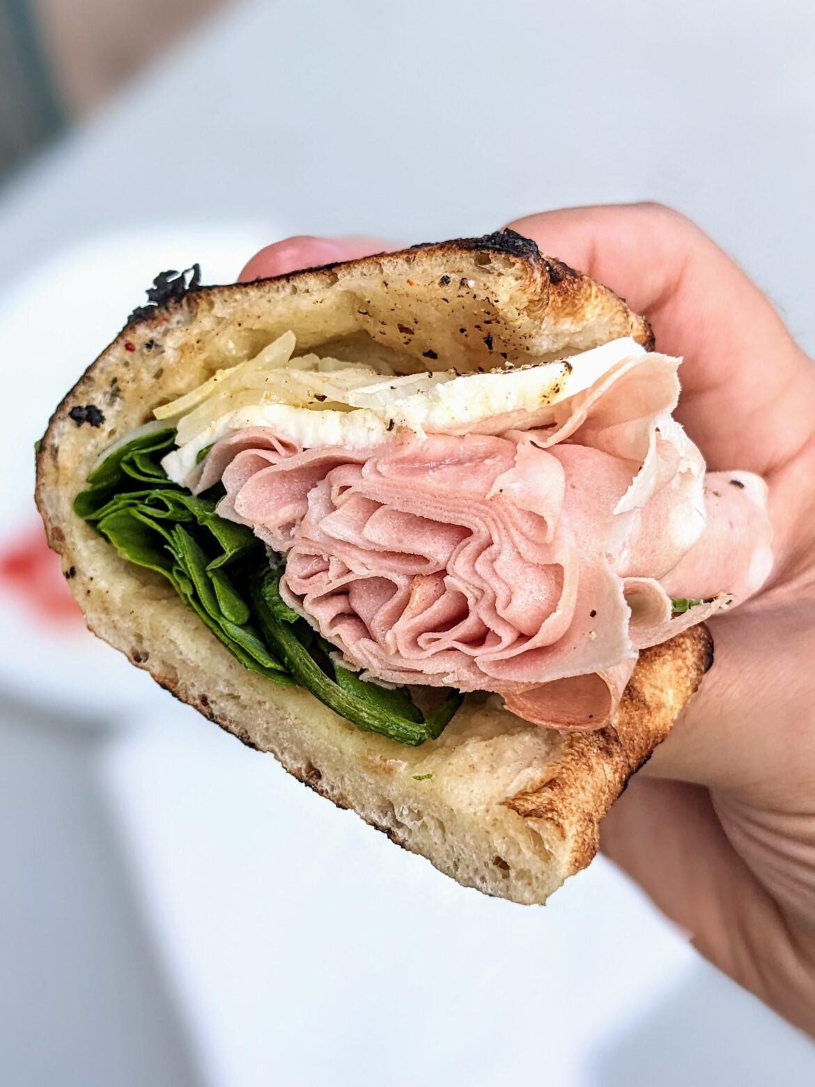 Mortadella, mozzarella, arugula, shaved fennel on homemade piadina